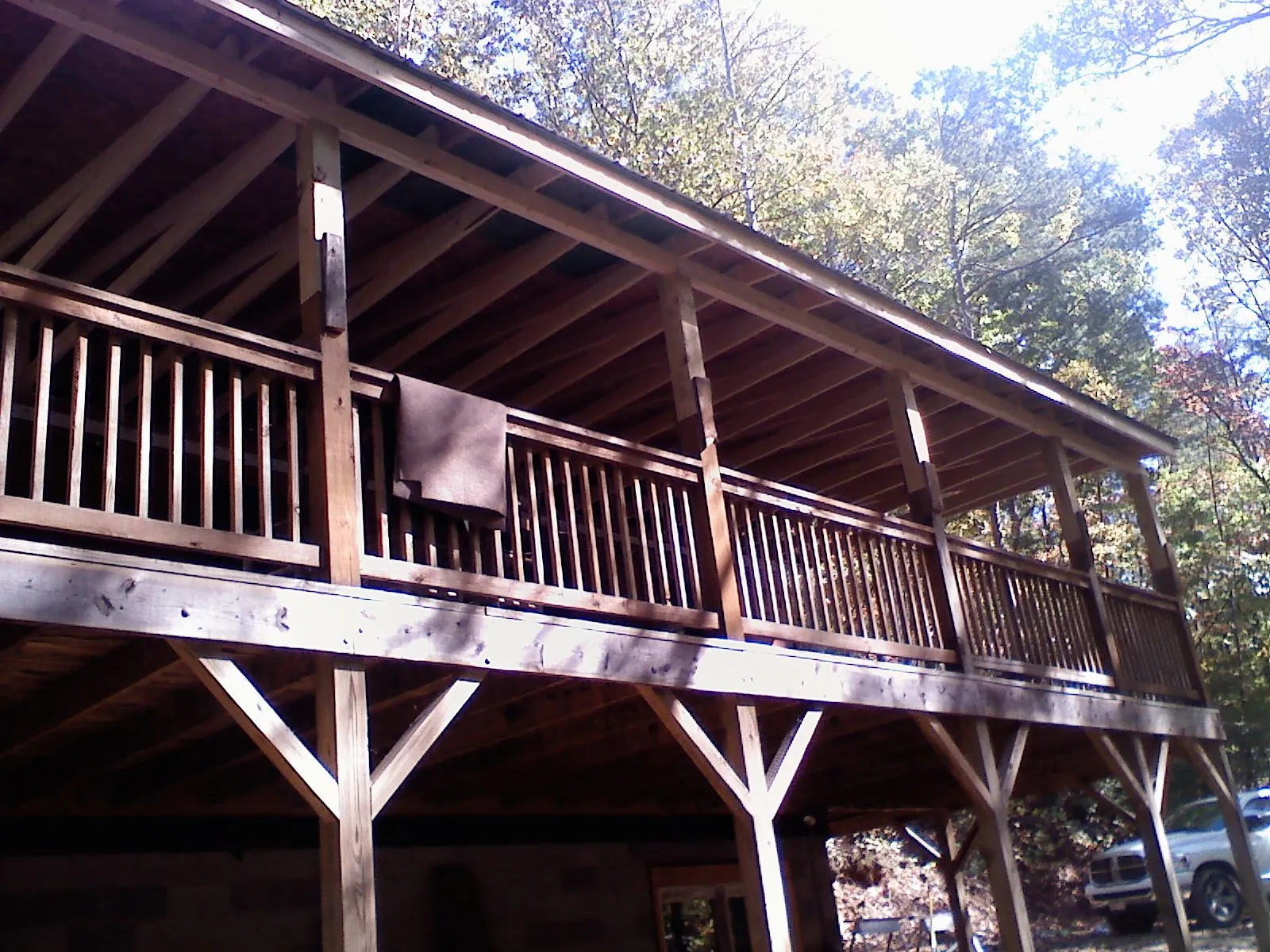Timber framing under a new elevated porch and deck — Roof Leak Repair in Hughes Springs by Roofing Brothers